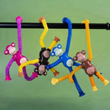 Funny Telescopic Suction Monkey Toy