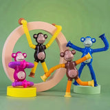 Funny Telescopic Suction Monkey Toy