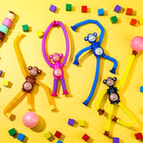 Funny Telescopic Suction Monkey Toy